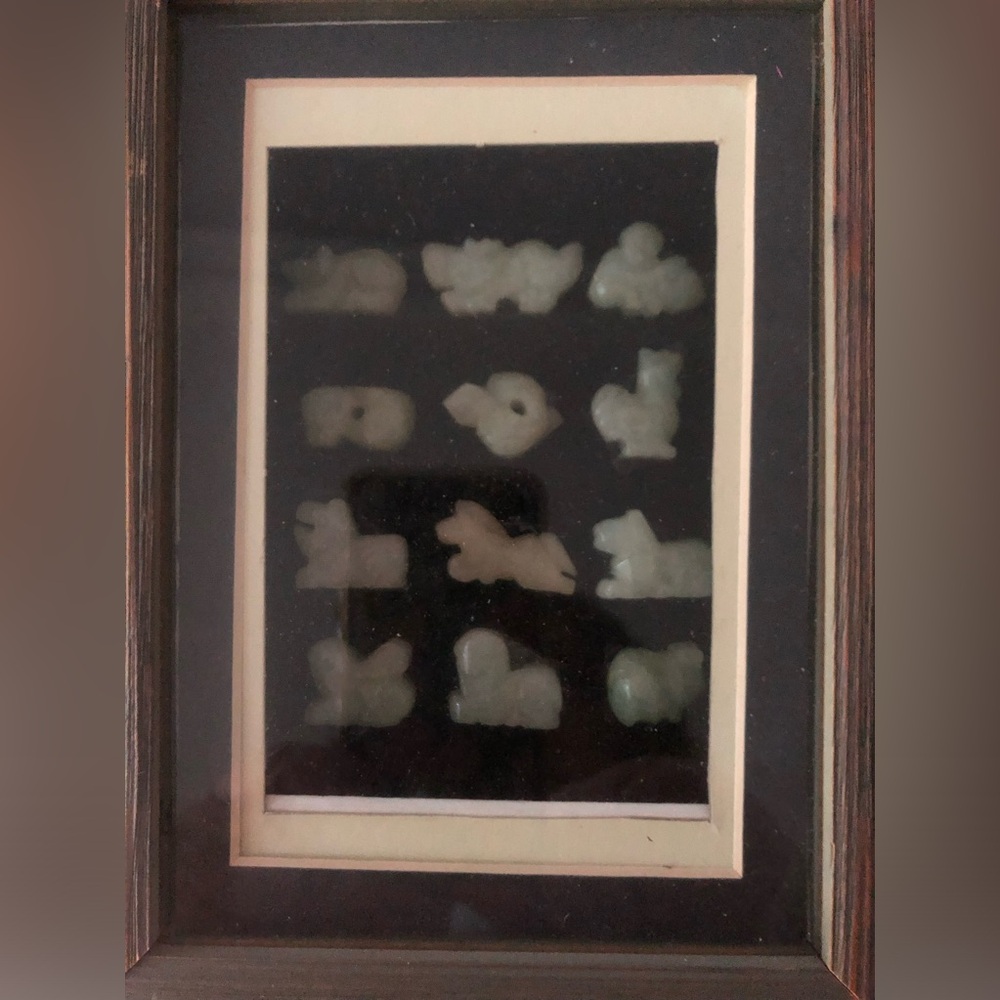 Vintage. Twelve hand-carved jade pieces.